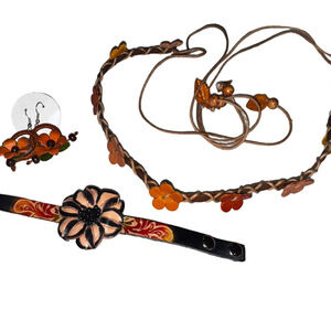 Handmade leather earrings, bracelet, and headband